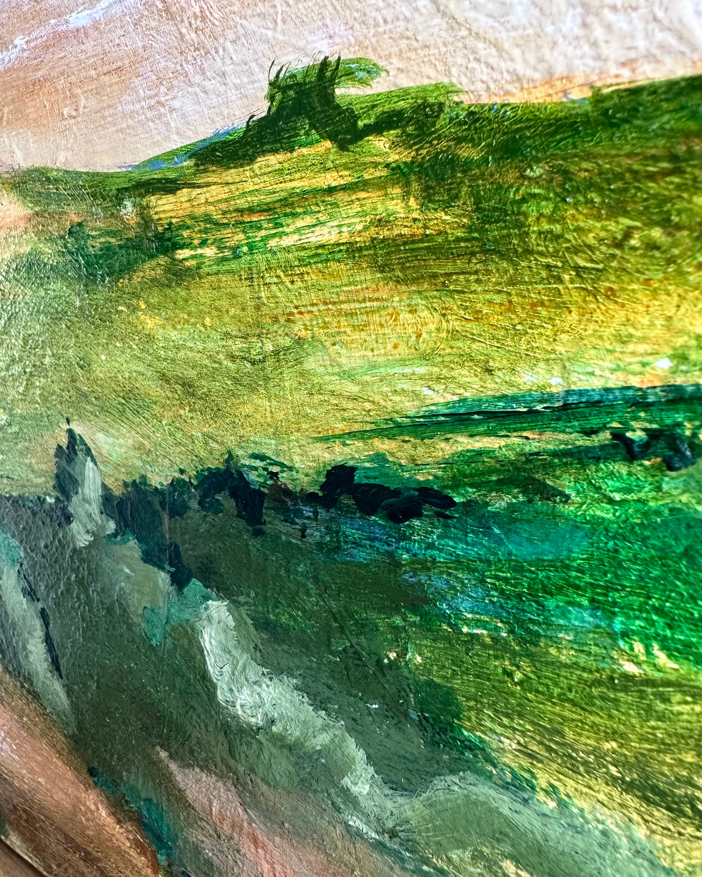 Close-up of a textured green landscape painting with brush strokes.